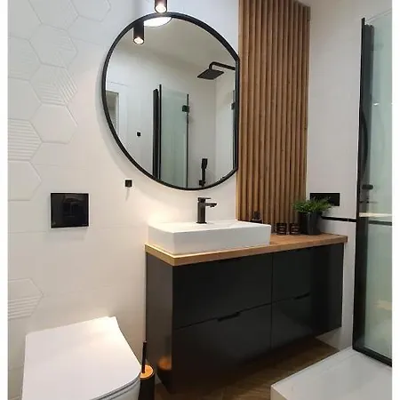 아파트 Odrodzenia 14 슈치트노