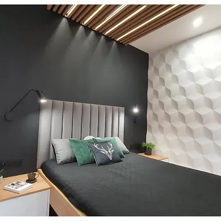 아파트 Odrodzenia 14 슈치트노